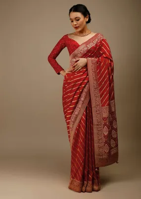 Apple Red Saree In Silk With Diagonal Stripes And Red Brocade Bandhani Pallu And Border Along With Unstitched Blouse