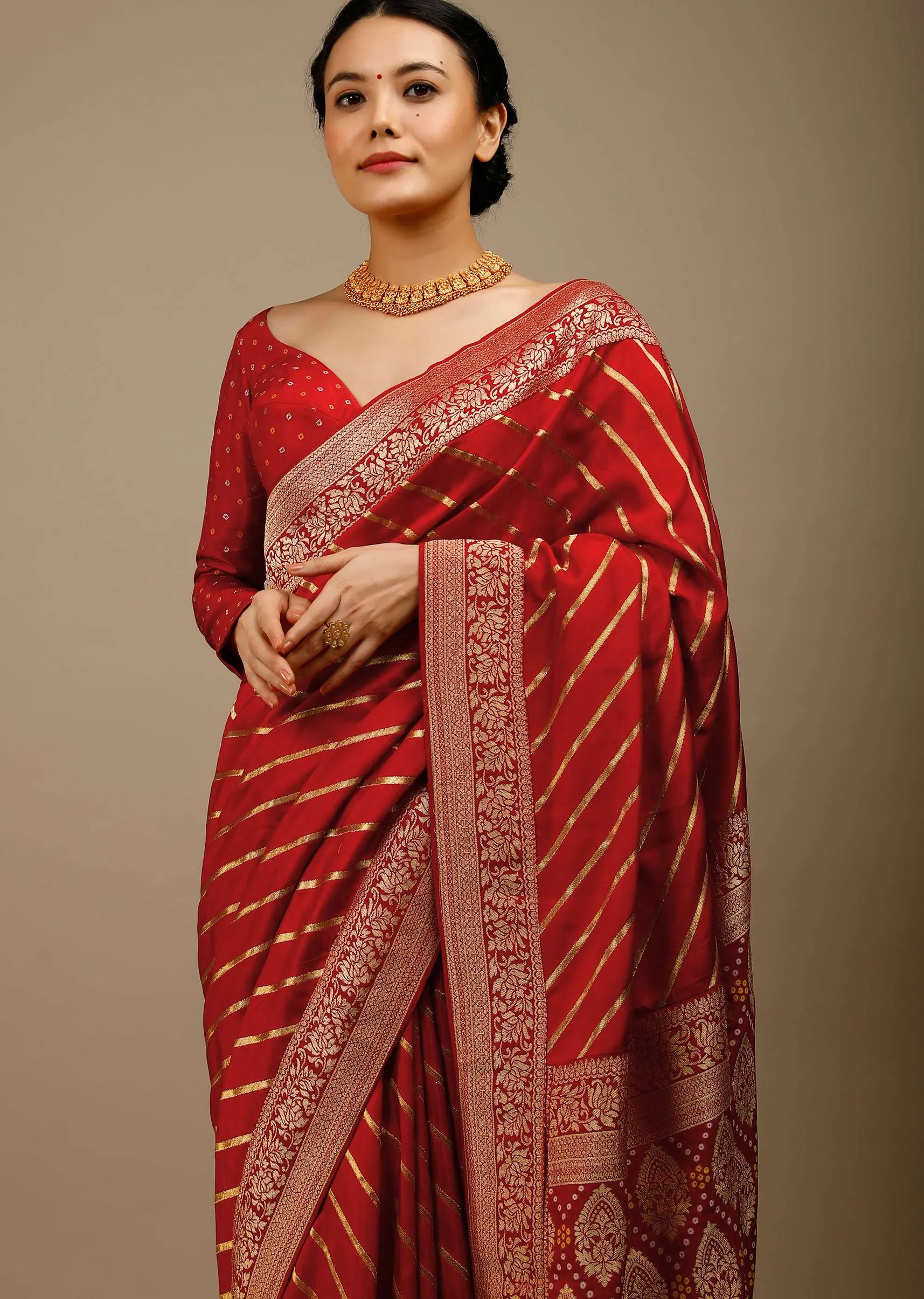 Apple Red Saree In Silk With Diagonal Stripes And Red Brocade Bandhani Pallu And Border Along With Unstitched Blouse