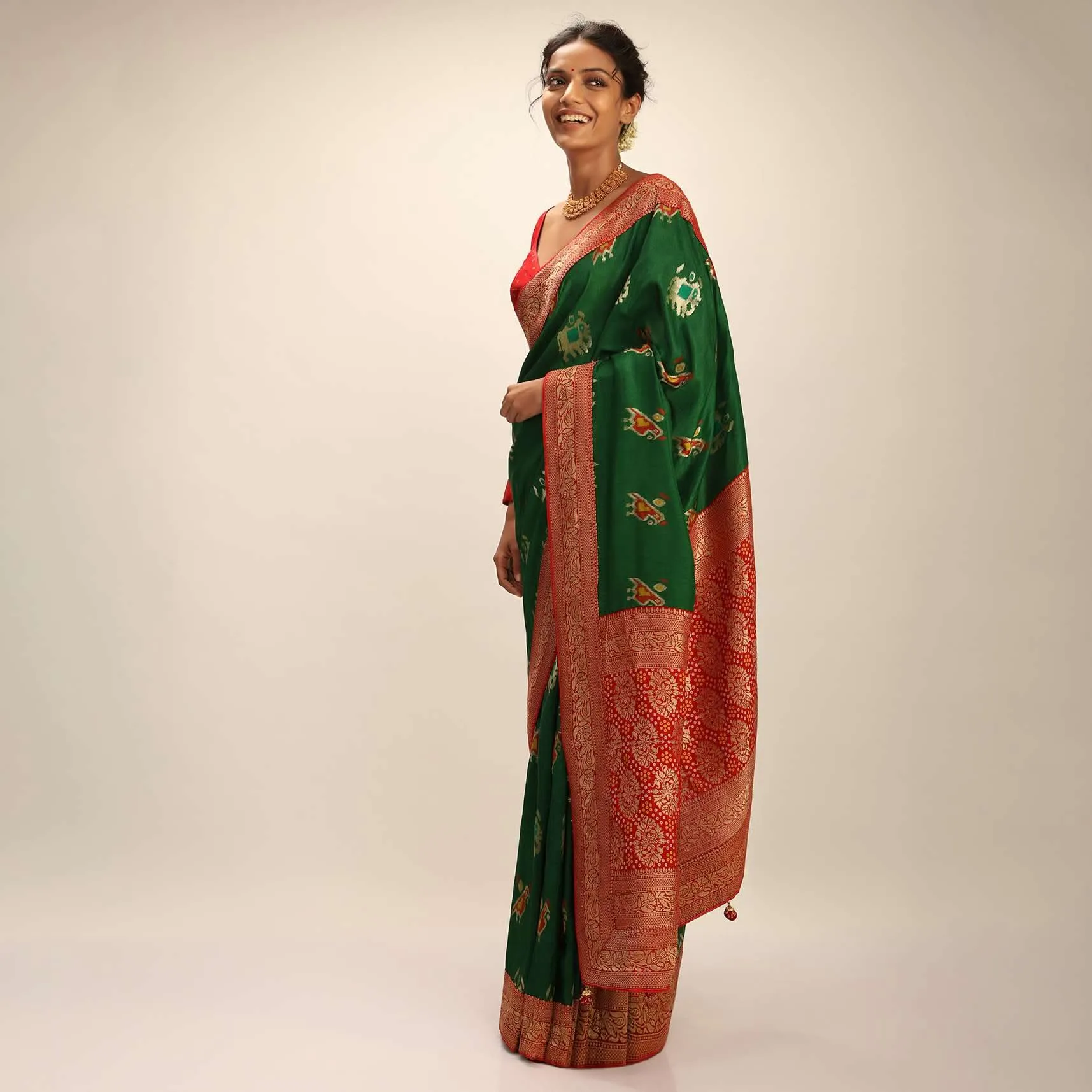 Forest Green Saree In Silk With Elephant And Bird Motifs And Red Brocade Bandhani Pallu And Border Along With Unstitched Blouse