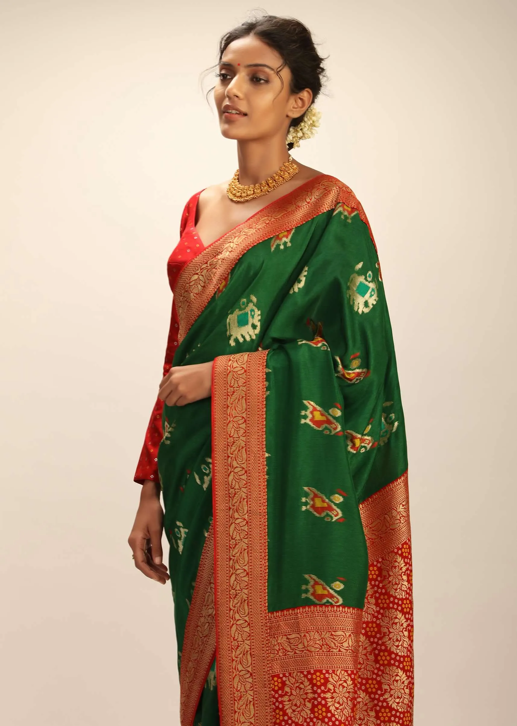 Forest Green Saree In Silk With Elephant And Bird Motifs And Red Brocade Bandhani Pallu And Border Along With Unstitched Blouse