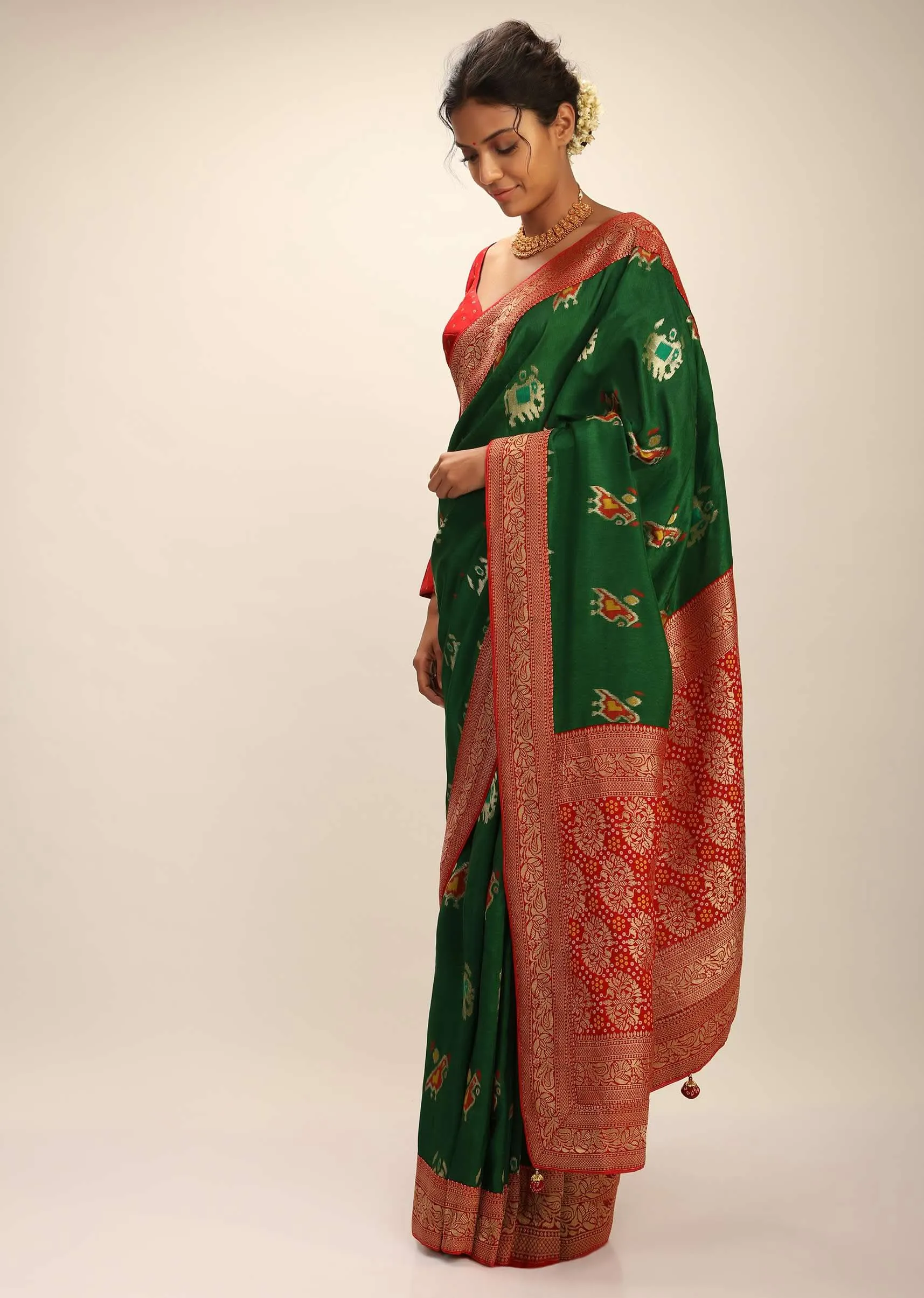 Forest Green Saree In Silk With Elephant And Bird Motifs And Red Brocade Bandhani Pallu And Border Along With Unstitched Blouse