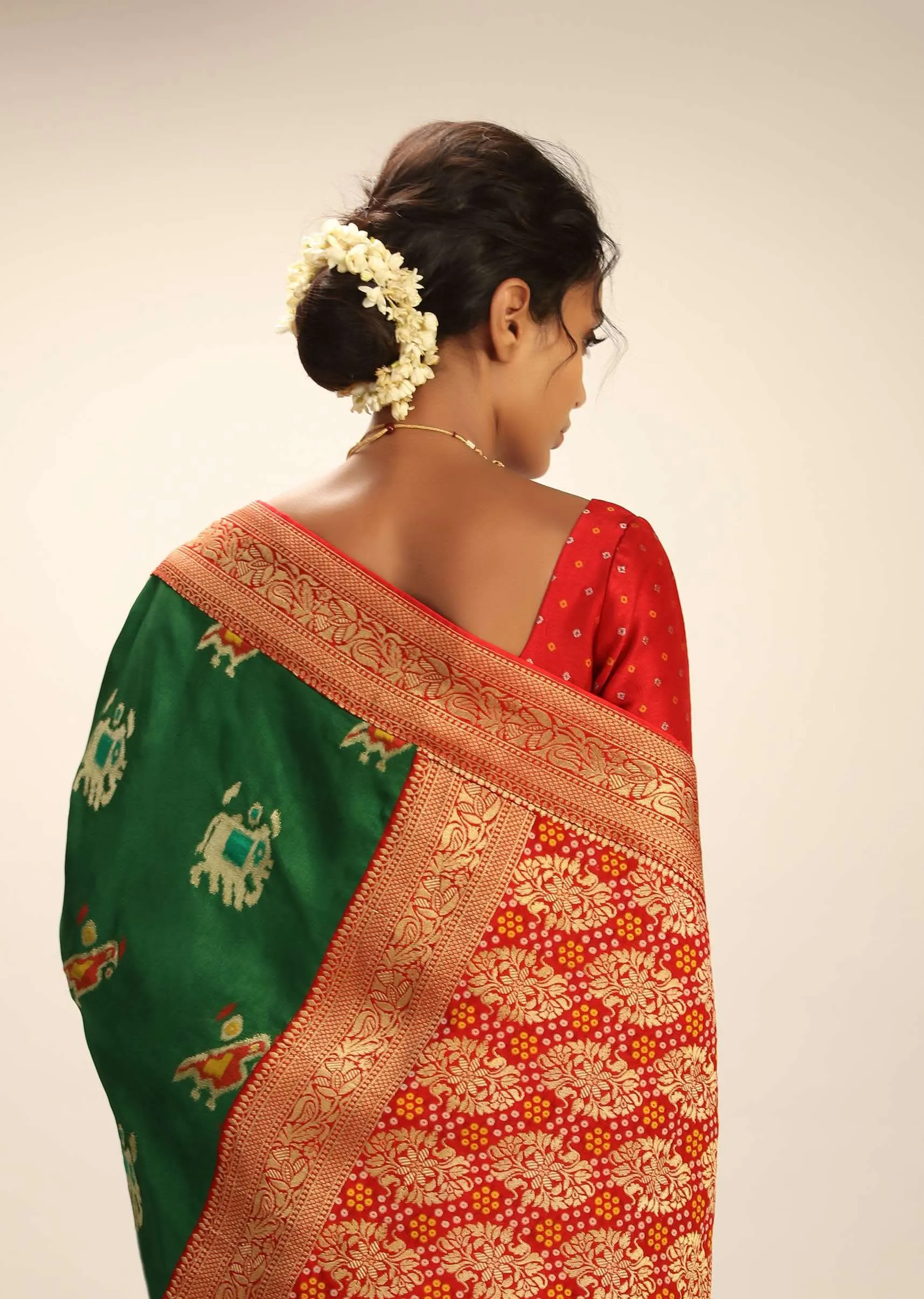 Forest Green Saree In Silk With Elephant And Bird Motifs And Red Brocade Bandhani Pallu And Border Along With Unstitched Blouse